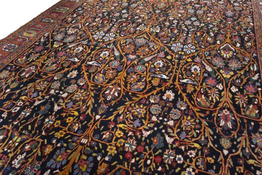 Backside of handmade 1930s Bakhtiar rug showing knot structure and weave density