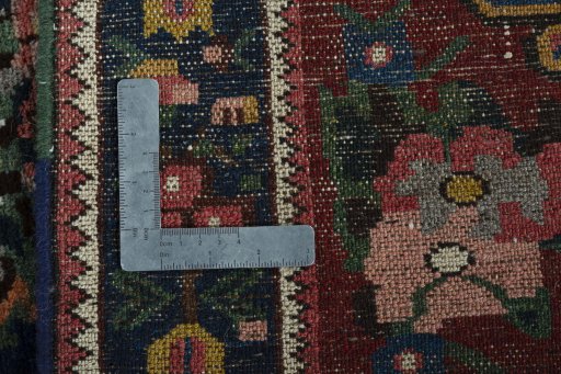 Backside of handmade 1930s Bakhtiar rug showing knot structure and weave density