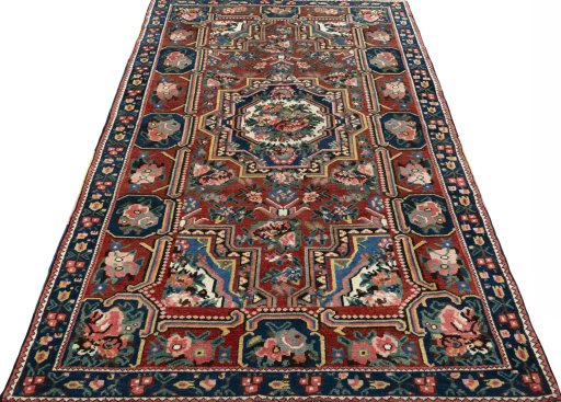 Surface texture of 1930s Bakhtiar rug with natural Wool and intricate pattern
