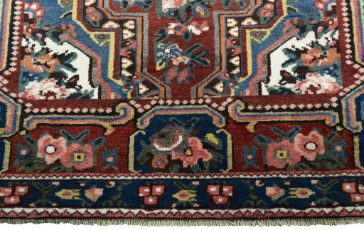 Full view of 1930s Bakhtiar rug from Iran / Persia, 234 × 148 cm in Red tones