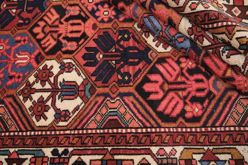 Corner detail of 1970s Bakhtiar rug showing border pattern and Wool pile