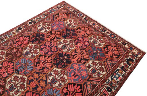 Surface texture of 1970s Bakhtiar rug with natural Wool and intricate pattern