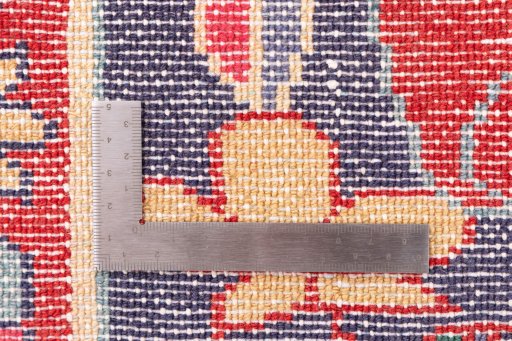 Close-up detail of 1970s Bakhtiar rug from Iran / Persia showing Wool weave