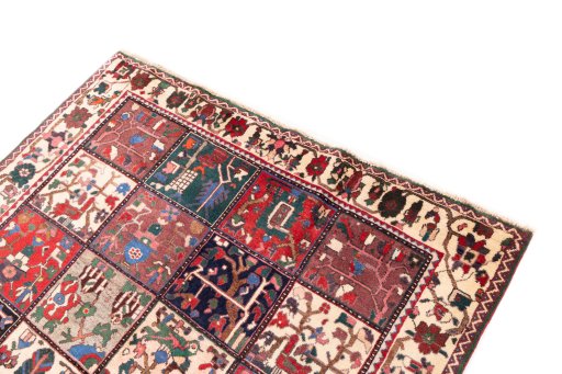 Surface texture of 1985s Bakhtiar rug with natural Wool and intricate pattern