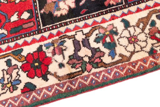 Backside of handmade 1985s Bakhtiar rug showing knot structure and weave density