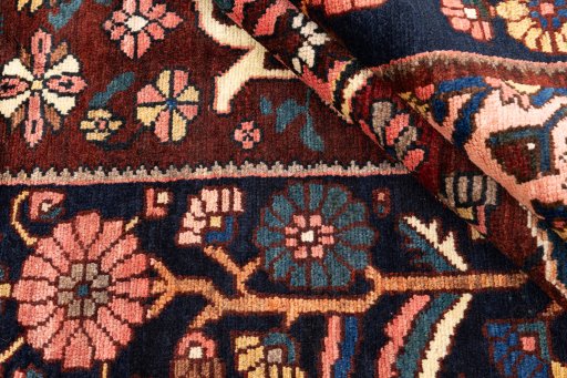 Corner detail of 1974s Bakhtiar rug showing border pattern and Wool pile