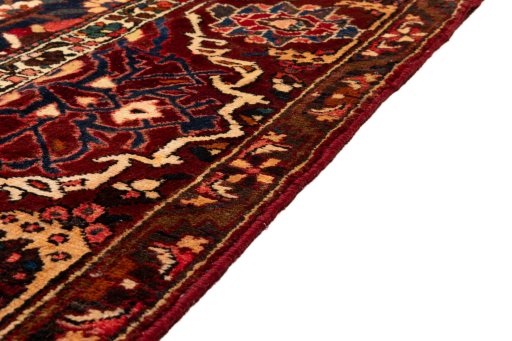 Full view of 1990s Bakhtiar rug from Iran / Persia, 375 × 280 cm in Red tones