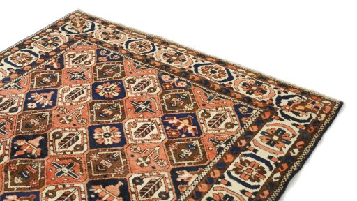 Surface texture of 1990s Bakhtiar rug with natural Wool and intricate pattern