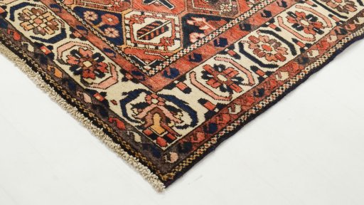 Backside of handmade 1990s Bakhtiar rug showing knot structure and weave density