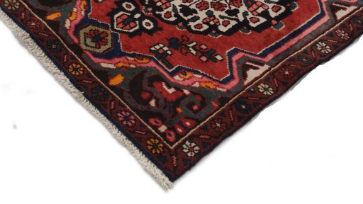 Backside of handmade 2000s Bakhtiar rug showing knot structure and weave density