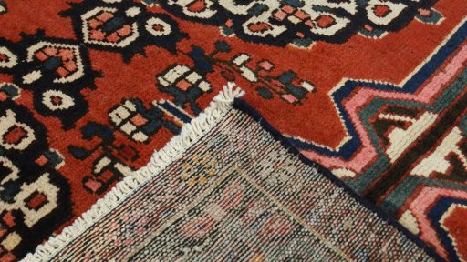 Close-up detail of 2000s Bakhtiar rug from Iran / Persia showing Wool weave
