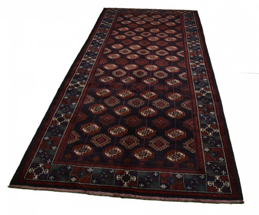 Central medallion detail of 2000s Baloch rug from Iran / Persia