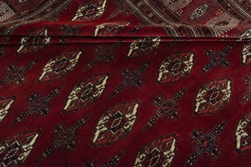 Full view of 2000s Baloch rug from Iran / Persia, 392 × 290 cm in Red tones
