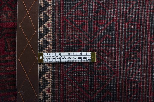 Close-up detail of 2000s Baloch rug from Iran / Persia showing Wool weave