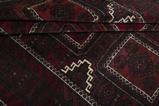 Full view of 2000s Baloch rug from Iran / Persia, 275 × 165 cm in Red tones