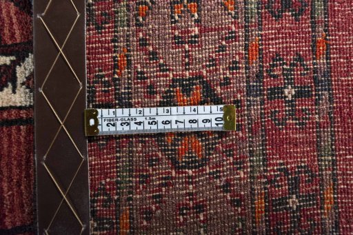 Full view of 2000s Baloch rug from Iran / Persia, 288 × 210 cm in Red tones