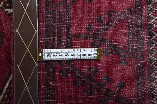 Close-up detail of 2000s Baloch rug from Iran / Persia showing Wool weave