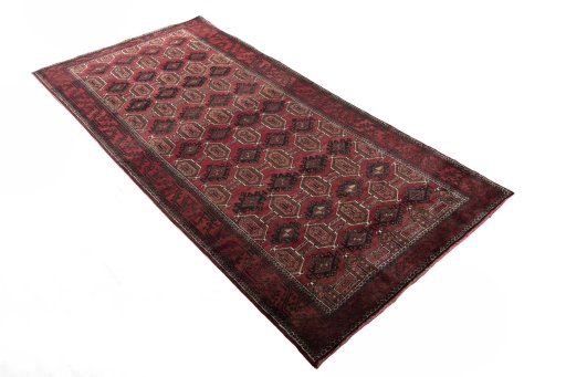 Close-up detail of 2000s Baloch rug from Iran / Persia showing Wool weave