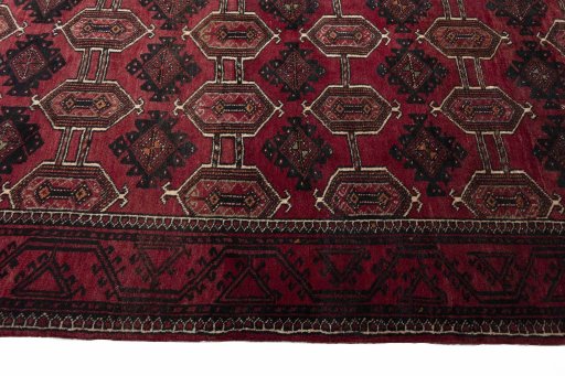 Close-up detail of 2000s Baloch rug from Iran / Persia showing Wool weave