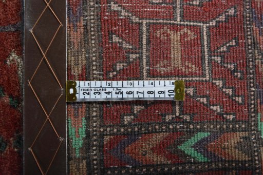 Close-up detail of 2000s Baloch rug from Iran / Persia showing Wool weave