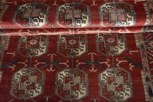 Full view of 2000s Baloch rug from Iran / Persia, 235 × 129 cm in Red tones