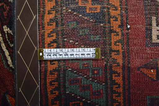Close-up detail of 2000s Baloch rug from Iran / Persia showing Wool weave