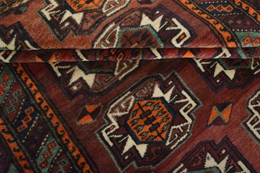 Full view of 2000s Baloch rug from Iran / Persia, 229 × 141 cm in Red tones