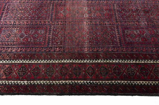 Close-up detail of 2000s Baloch rug from Iran / Persia showing Wool weave