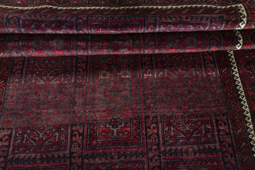 Full view of 2000s Baloch rug from Iran / Persia, 297 × 154 cm in Red tones