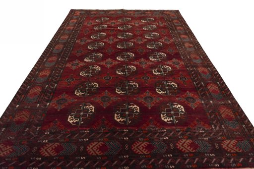 Surface texture of 2000s Baloch rug with natural Wool and intricate pattern