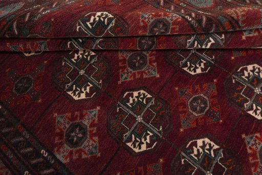 Full view of 2000s Baloch rug from Iran / Persia, 331 × 215 cm in Red tones