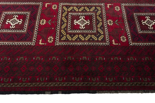 Close-up detail of 2000s Baloch rug from Iran / Persia showing Wool weave