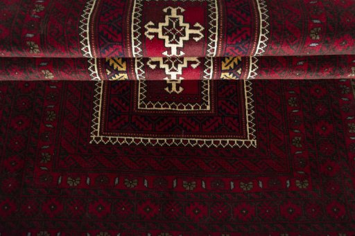 Full view of 2000s Baloch rug from Iran / Persia, 220 × 118 cm in Red tones