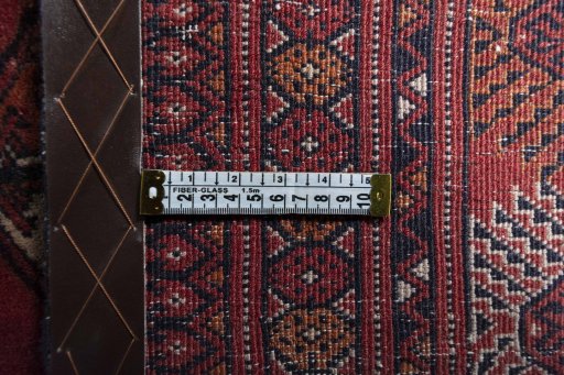 Close-up detail of 2000s Baloch rug from Iran / Persia showing Wool weave