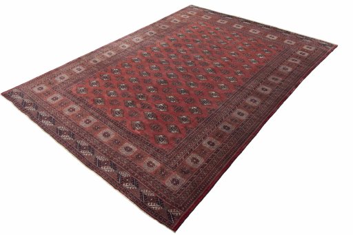 Corner detail of 2000s Baloch rug showing border pattern and Wool pile