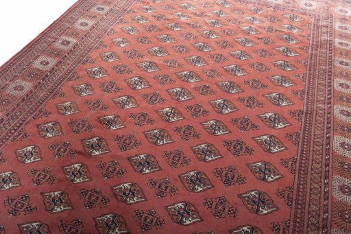 Backside of handmade 2000s Baloch rug showing knot structure and weave density