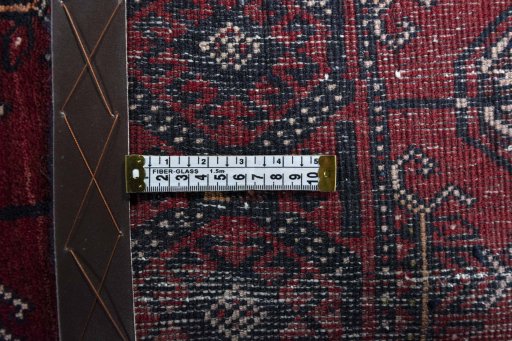 Close-up detail of 2000s Baloch rug from Iran / Persia showing Wool weave