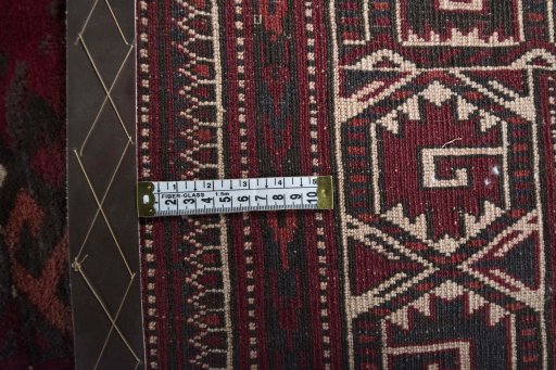 Close-up detail of 1970s Baloch rug from Iran / Persia showing Wool weave