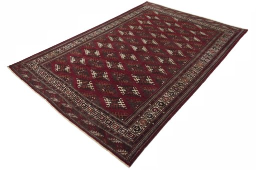 Corner detail of 1970s Baloch rug showing border pattern and Wool pile