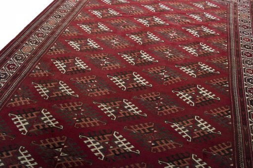 Backside of handmade 1970s Baloch rug showing knot structure and weave density