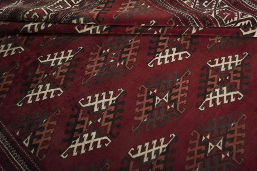 Full view of 1970s Baloch rug from Iran / Persia, 345 × 240 cm in Red tones