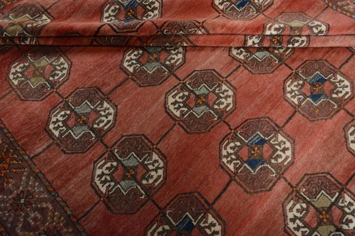 Corner detail of 1970s Baloch rug showing border pattern and Wool pile