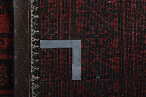 Close-up detail of 2000s Baloch rug from Iran / Persia showing Wool weave