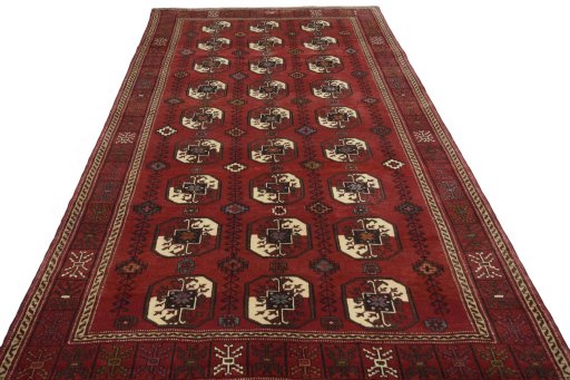Surface texture of 2000s Baloch rug with natural Wool and intricate pattern