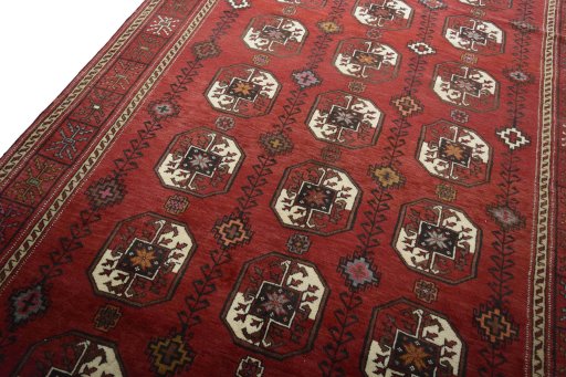 Backside of handmade 2000s Baloch rug showing knot structure and weave density