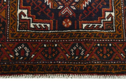 Central medallion detail of 2000s Baloch rug from Iran / Persia