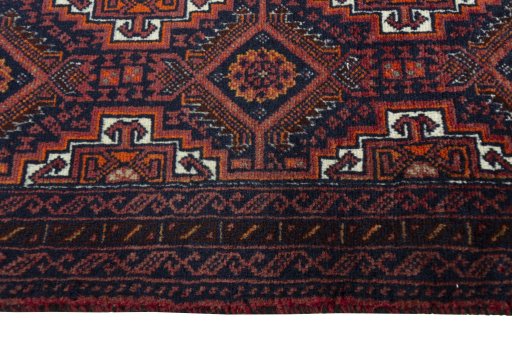 Close-up detail of 2000s Baloch rug from Iran / Persia showing Wool weave