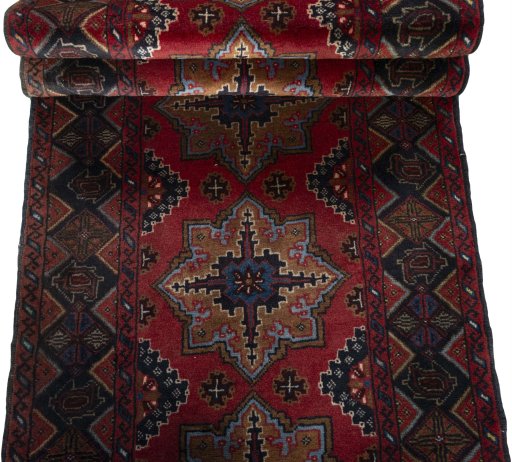 Full view of 2000s Baloch rug from Iran / Persia, 310 × 72 cm in Red tones
