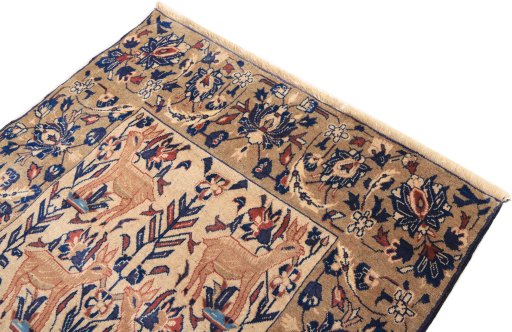 Surface texture of 1980s Baloch rug with natural Wool and intricate pattern