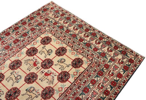 Surface texture of 1990s Baloch rug with natural Wool and intricate pattern